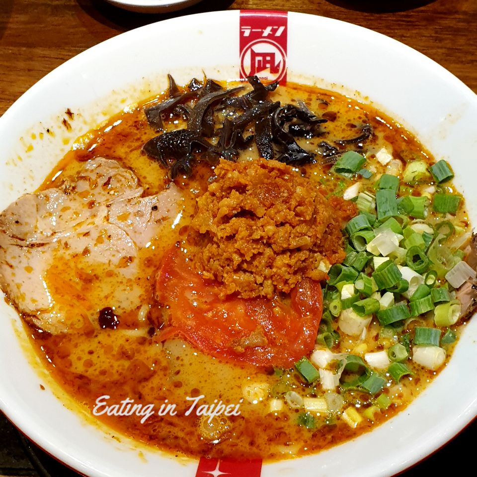 The limited edition tomato ramen has a tomato and miso base, topped with pork mince and tomato, with wood ear mushrooms, scallions, and char su pork.