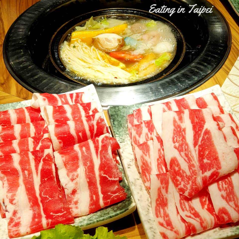 stone hot pot with meat on the side